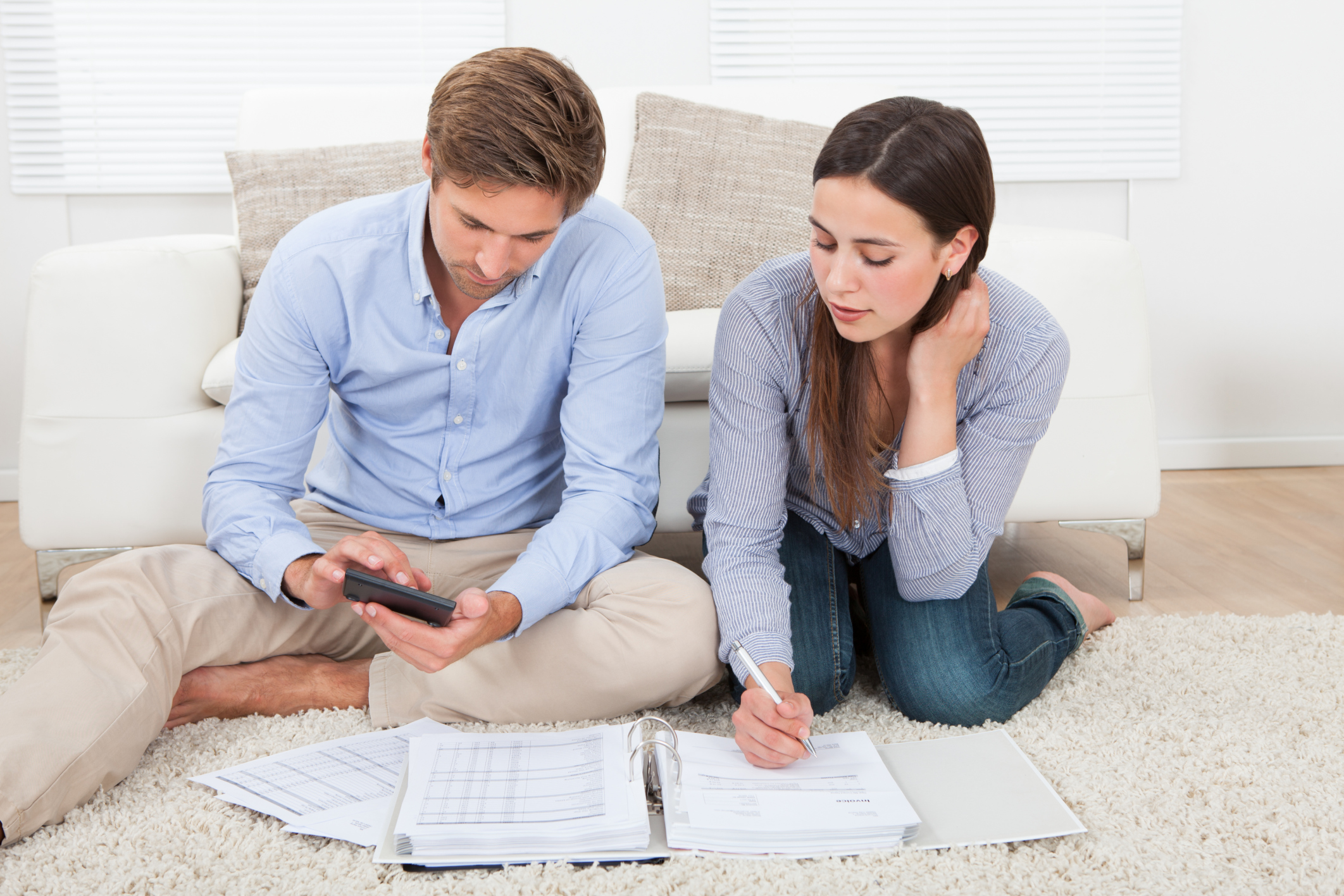 Young couple working on finances